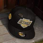 LOS ANGELES KINGS NHL BLACK PINK UV / NEW ERA 9FIFTY SNAPBACK